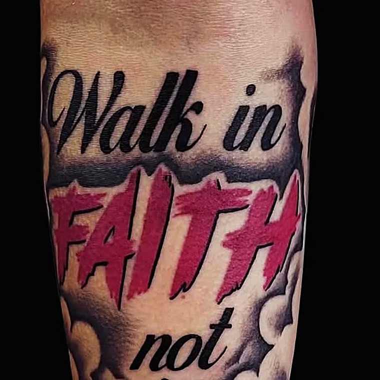 Script lettering tattoo reading Walk in FAITH